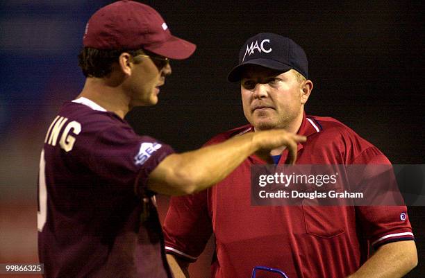 Charles Pickering, R-MS., gives some pointers to the home plate umpire during the 40th Annual Roll Call Congressional Baseball Game.