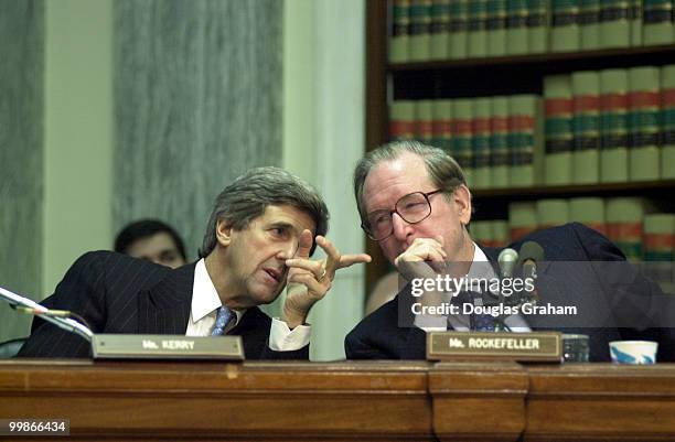 John Kerry, D-Mass., and John D. Rockefeller D-W.Va., talk during Donald Evans confirmation hearing before the Senate Commerce, Science and...