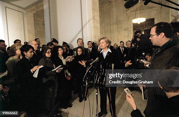 Hillary Clinton, D-N.Y., talks with reporters at a press conference in the Russell Senate Office Building about her brothers accepting money for...