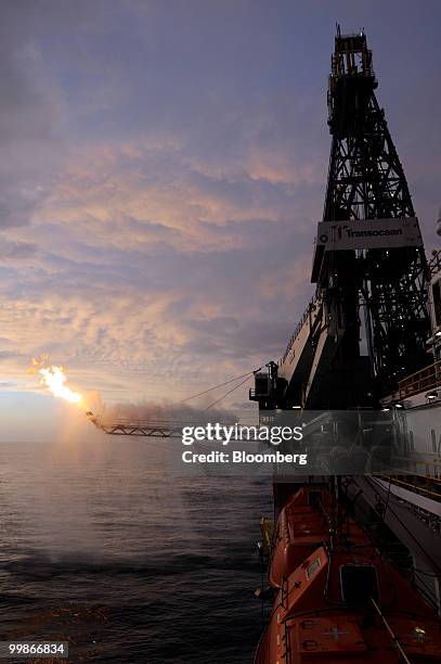 Gas from the damaged Deepwater Horizon wellhead is burned by the drillship Discoverer Enterprise, in a process known as flaring, in the Gulf of...