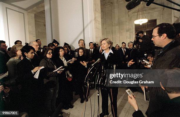 Hillary Clinton, D-N.Y., talks with reporters at a press conference in the Russell Senate Office Building about her brothers accepting money for...