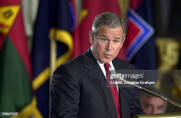 President George W. Bush makes opening remarks during the Holocaust Day of Remembrance in the Rotunda of the U.S. Capitol. In the background are some...