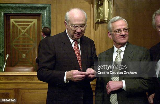 Phil Gramm, R-Texas, and Treasury Secretary Paul O'Neill during a ceremony to accept 12 plaster casts used in the production of the first state...