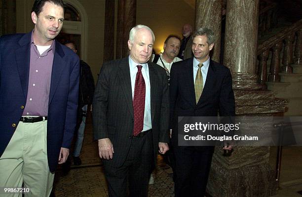 John McCain, R-Ariz., talks with reporters outside the Senate Luncheon about the Hagel Amendment.