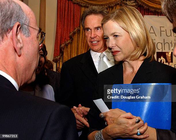Warren Beatty and Annette Bening talk with Henry Waxman, D-CA., during a reception to kick off the new political group, Progressive Majority.