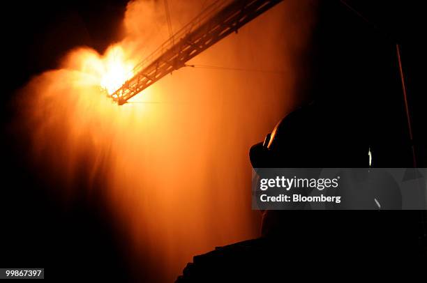 Gas from the damaged Deepwater Horizon wellhead is burned by the drillship Discoverer Enterprise, in a process known as flaring, in the Gulf of...