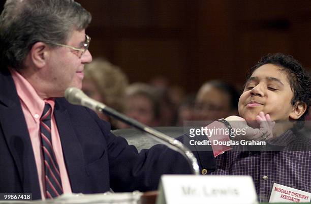 Jerry Lewis, chairman, Muscular Dystrophy Association, and Benjamin Cumbo, goodwill ambassador for Muscular Dystrophy Association, during a hearing...