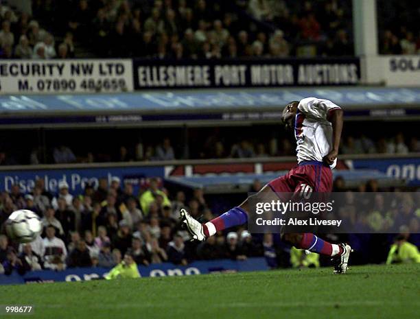 Clinton Morrison of Crystal Palace scores the winning penalty against Everton during the Worthington Cup second round match between Everton and...