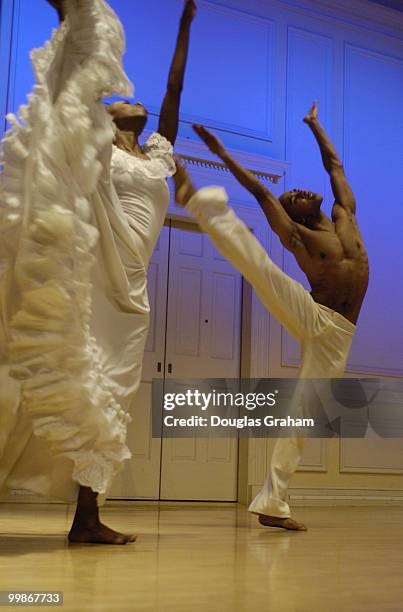 Dancers Dwana Adiaha Smallwood and Matthew Rushing of Alvin Ailey preformed a vignette of "Wade In The Water" during a press conference and...