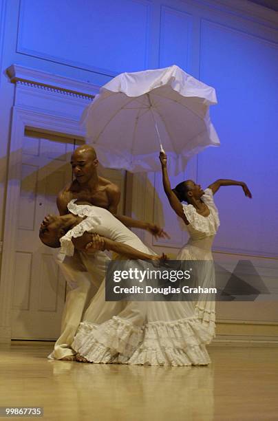 Dancers Renee Robinson, Dwana Adiaha Smallwood and Matthew Rushing of Alvin Ailey preformed a vignette of "Wade In The Water" during a press...