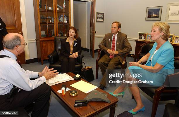 Martin Frost, D-TX., and Jennifer Dunn, R-WA., talk with Ed and Lois Smart of Salt Lake, Utah about pending legislation on the "Amber Alert". The...