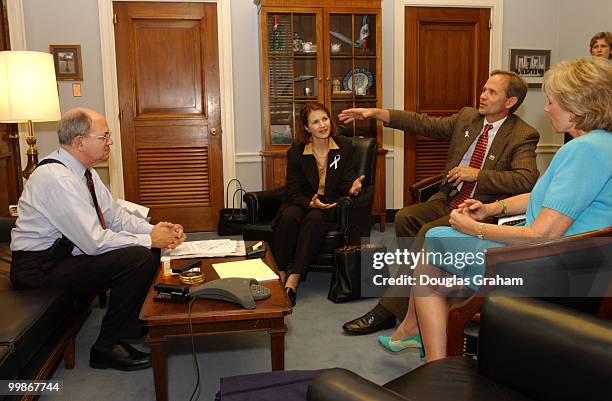 Martin Frost, D-TX., and Jennifer Dunn, R-WA., talk with Ed and Lois Smart of Salt Lake, Utah about pending legislation on the "Amber Alert". The...