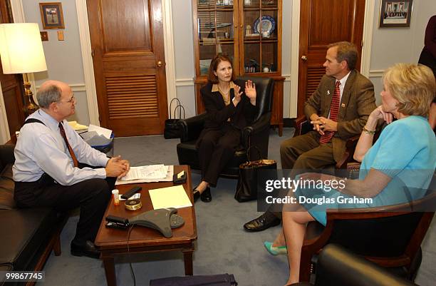 Martin Frost, D-TX., and Jennifer Dunn, R-WA., talk with Ed and Lois Smart of Salt Lake, Utah about pending legislation on the "Amber Alert". The...