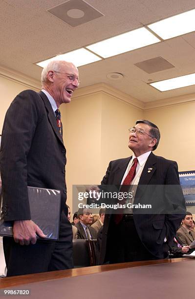 Transportation Secretary Norman Mineta is greeted by John W. Oliver, D-MA. , before the start of the Appropriations Transportation, Treasury and...