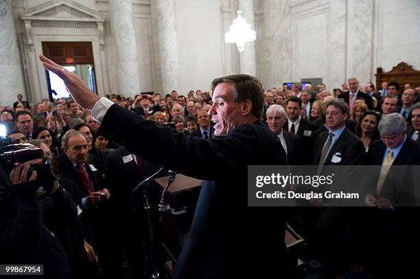 Mark Warner, D-VA., is greeted by well wishers in a standing room only Russell Caucus Room during his first day in the U.S. Senate on January 6, 2009.