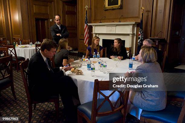 Mark Warner, D-VA., along with his daughters Gillian, Madison, Eliza wife Lisa Collis and father Robert Warner enjoy a private lunch in the Mansfield...