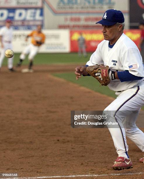 Joe Baca deals with yet another droped the ball during the 2004 Congressional Baseball Game.
