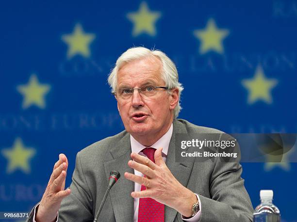 Michel Barnier, the European Union's internal market commissioner, gestures during a news conference following the meeting of European Union finance...