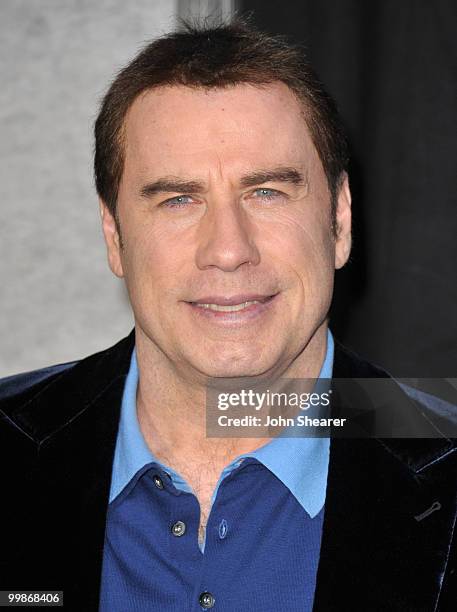 Actor John Travolta arrives to "The Last Song" Los Angeles Premiere at ArcLight Hollywood on March 25, 2010 in Hollywood, California.