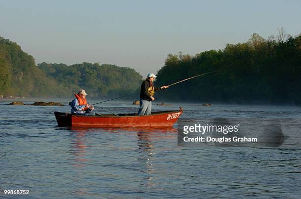 Fishermen try for the early morning catch of the day during the Congressional Sportsmen's Foundation annual shad fishing event on the Potomac River...