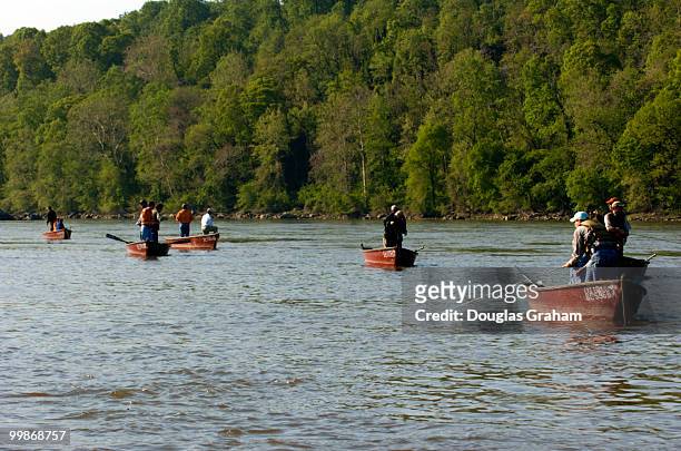 Fishermen enjoy the col spring morning and perfect weather during the Congressional Sportsmen's Foundation annual shad fishing event on the Potomac...