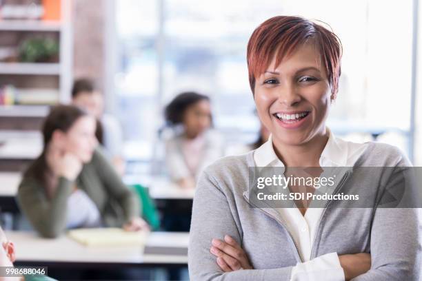 confident african american school teacher - school principal stock pictures, royalty-free photos & images