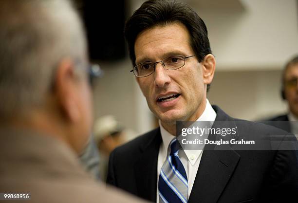 Congressman Eric Cantor, R-VA, listens to Dan Tate of Warrenton Virginia during a job fair at the Germanna Community College, Daniel Technology...