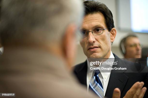 Congressman Eric Cantor, R-VA, listens to Dan Tate of Warrenton Virginia during a job fair at the Germanna Community College, Daniel Technology...