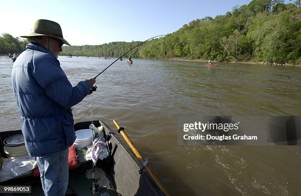 Mike Alper volunteers for the Congressional Sportsmen's Foundation during the annual shad fishing event on the Potomac River at Fletcher's Boat House...