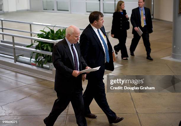 John McCain, R-AZ., arrives in the Senate subway on his way to the U.S. Capitol, Dec. 14, 2009.