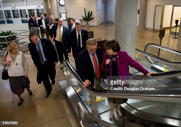 Mark Pryor, D-AR., Sheldon Whitehouse, D-RI., Byron Dorgan, D-ND., and Dianne Feinstein, D-CA.,arrive in the Senate subway on their way to the Senate...