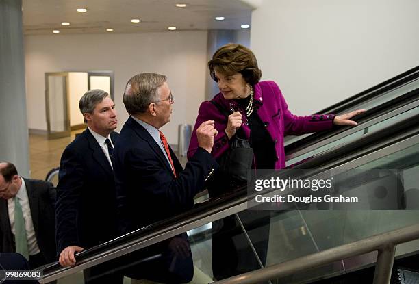 Sheldon Whitehouse, D-RI., Byron Dorgan, D-ND., and Dianne Feinstein, D-CA.,arrive in the Senate subway on their way to the Senate Democratic Caucus...