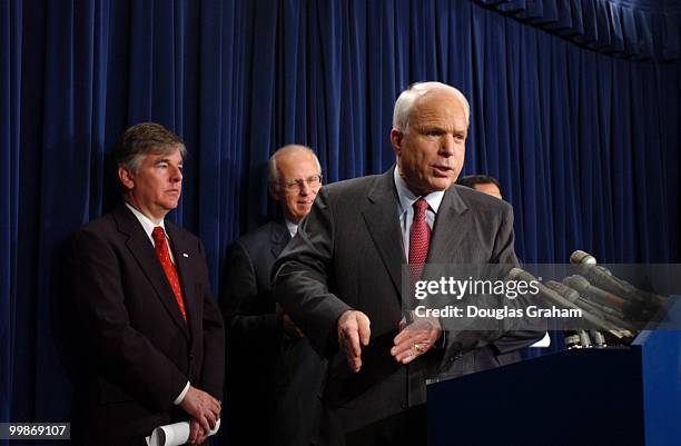 John McCain, R-Ariz.; Russell Feingold, D-Wis.; Christopher Shays, R-Conn., and Martin Meehan, D-Mass., during a news conference to respond to the...