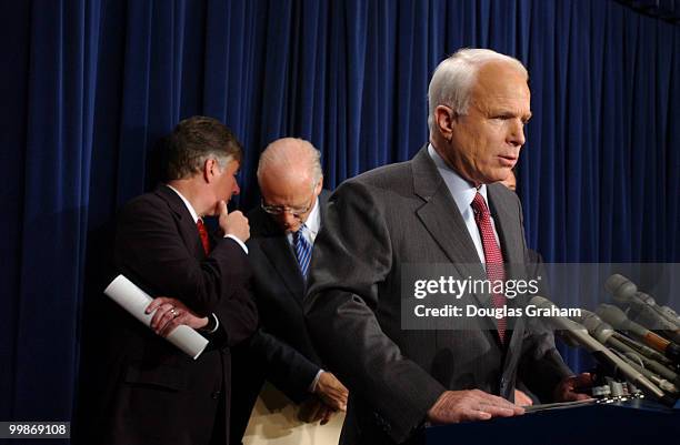 John McCain, R-Ariz.; Russell Feingold, D-Wis.; Christopher Shays, R-Conn., and Martin Meehan, D-Mass., during a news conference to respond to the...