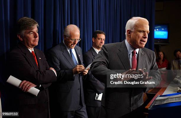 John McCain, R-Ariz.; Russell Feingold, D-Wis.; Christopher Shays, R-Conn., and Martin Meehan, D-Mass., during a news conference to respond to the...