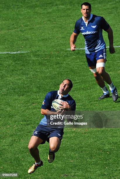 Fourie du Preez and Pierre Spies of the Bulls in action during a Vodacom Bulls training session at Orlando Stadium on May 18, 2010 in Soweto,...