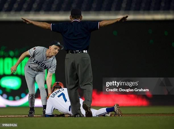 Adam Smith, D-WA. Tries in vane to tag Sam Graves, R-MO., at 2nd base during the 47th Annual Roll Call Congressional Baseball Game at Nationals Park...