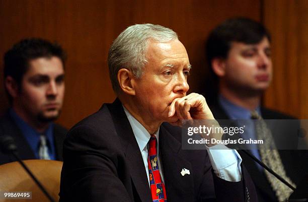 Chairman Orrin Hatch, R-UT., listens to Sam Brownback, R-KS., and Jim Langevinn, D-RI., during a full committee hearing on "Drawing the Line Between...