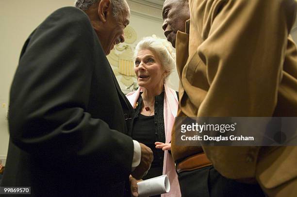 John Conyers, Jr., D-MI., greets recording artist Judy Collins and Sam Moore before the start of the House Judiciary Committee Ensuring Artists Fair...