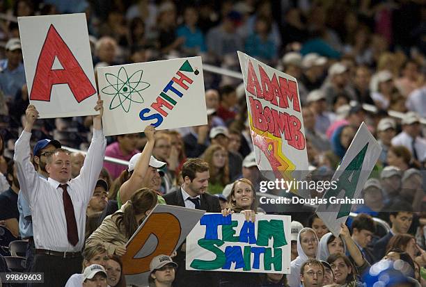 Fans hold up signs during the 48th Annual Roll Call Congressional Baseball Game on June 17, 2009 at Nationals Park in Washington, D.C.