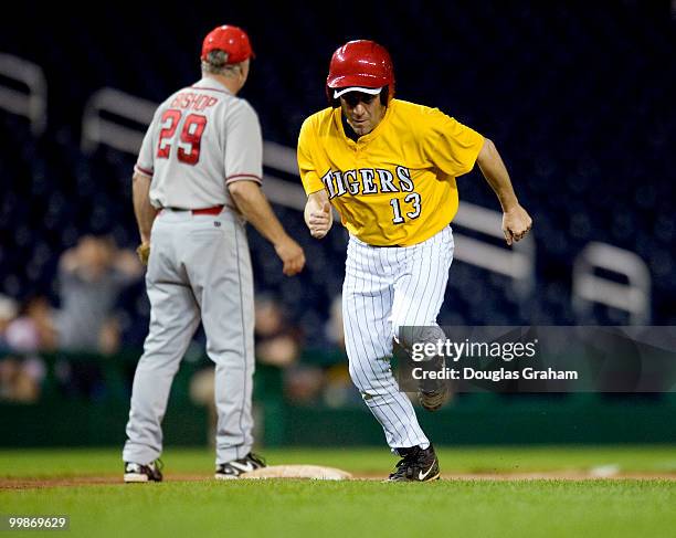 Steve Scalise, R-LA., heads for home during the 48th Annual Roll Call Congressional Baseball Game on June 17, 2009 at Nationals Park in Washington,...