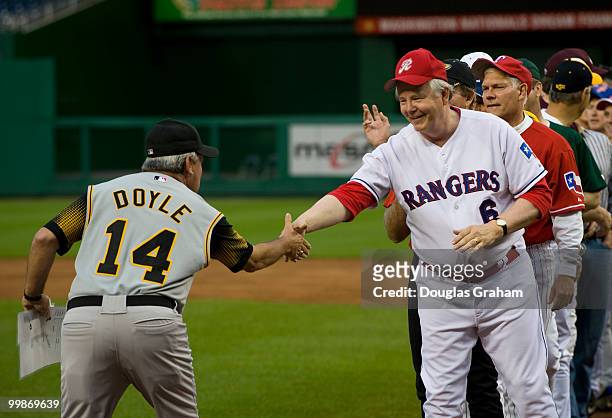 The coaches Mike Doyle, D-PA., and Joe Barton, R-Texas, shake hands before the 48th Annual Roll Call Congressional Baseball Game on June 17, 2009 at...