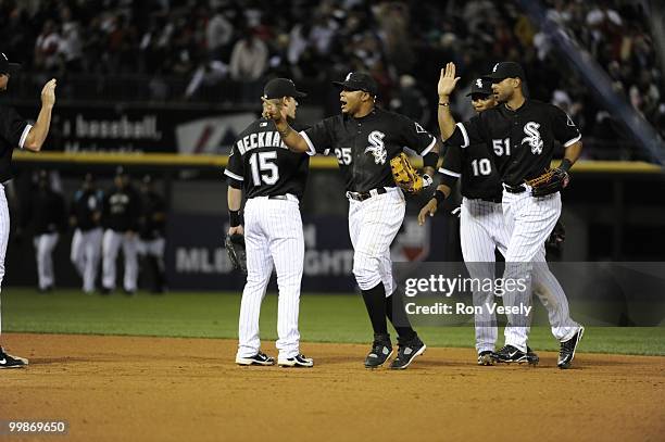 Andruw Jones and Alex Rios of the Chicago White Sox celebrates with teammates after the game against the Kansas City Royals on May 03, 2010 at U.S....