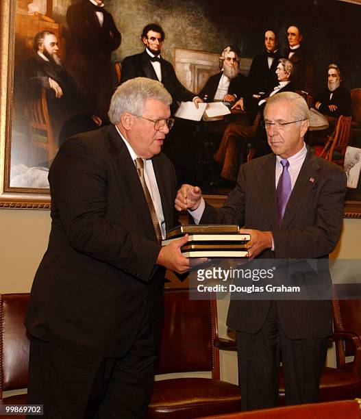 European condolence books presented to Speaker of the House Dennis Hastert, R-Ill., by Rockwell Schnabel, U.S. Ambassador.