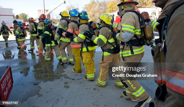 The Congressional Fire Training program held by the Congressional Fire Services Unit. 60 to 70 hill staffers are shuttled to College Park, put in...