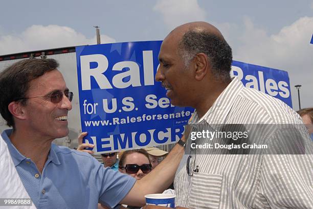 Josh Rales and Michael Steele enjoy a laugh during the 30th annual J. Millard Tawes Crab and Clam Bake in Crisfield Maryland.