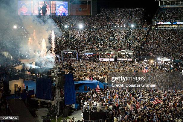Barack Obama watches the fire works after his acceptance of the Democratic presidential nomination at Invesco Field at Mile High at the 2008...