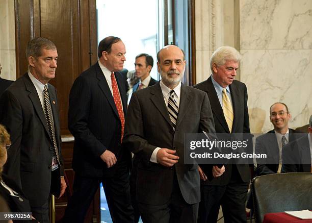 Richard Shelby, R-Al., Federal Reserve Board Chairman Ben Bernanke and Chris Dodd, D-CT., enter the Senate Banking, Housing and Urban Affairs...