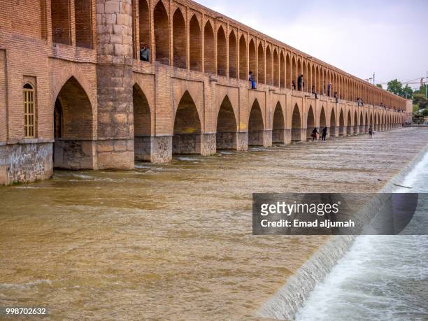 si-o-seh pol (the bridge of thirty-three spans), isfahan, iran - isfahan province stock pictures, royalty-free photos & images