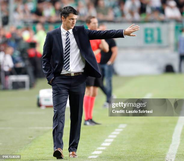 Head coach Vladimir Ivic of Maccabi Tel Aviv FC reacts during the UEFA Europa League First Qualifying Round 1st Leg match between Ferencvarosi TC and...